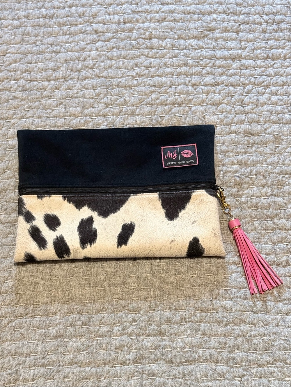 Makeup Junkie Bag Black & Cowhide Cosmetic Clutch with Pink Tassel
